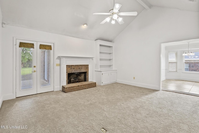 1035 N Azalea Dr, Madison, MS 39110 - unfurnished living room with plenty of natural light, carpet, beam ceiling, a ceiling fan, and french doors