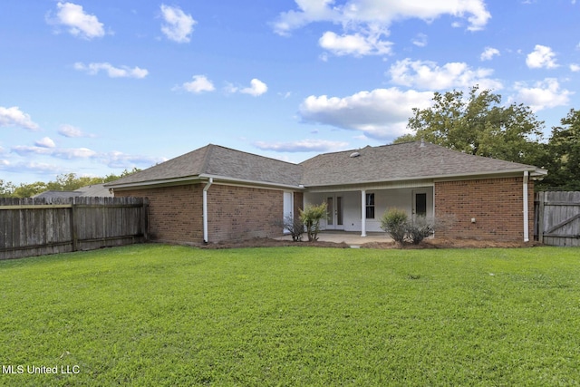 1035 N Azalea Dr, Madison, MS 39110 - rear view of property with brick siding, a patio area, and a shingled roof