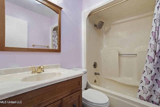 full bathroom featuring vanity, toilet, and shower / bath combo with shower curtain