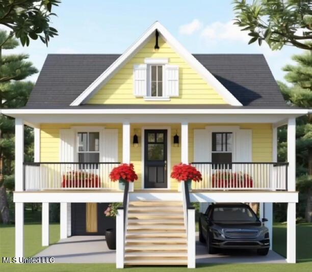 423 Royal Oak Dr, Pass Christian, MS 39571 - view of front facade featuring covered porch