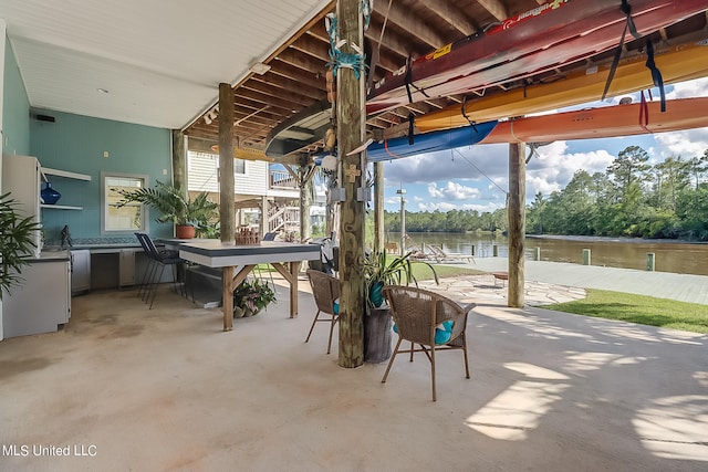 view of patio / terrace with a water view