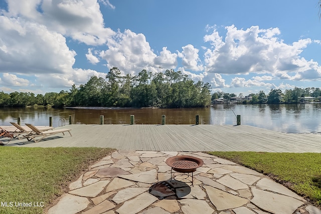 view of dock featuring a water view and a fire pit