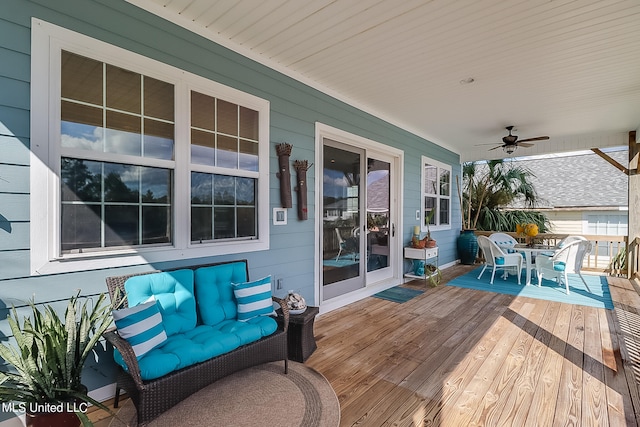 wooden terrace with ceiling fan