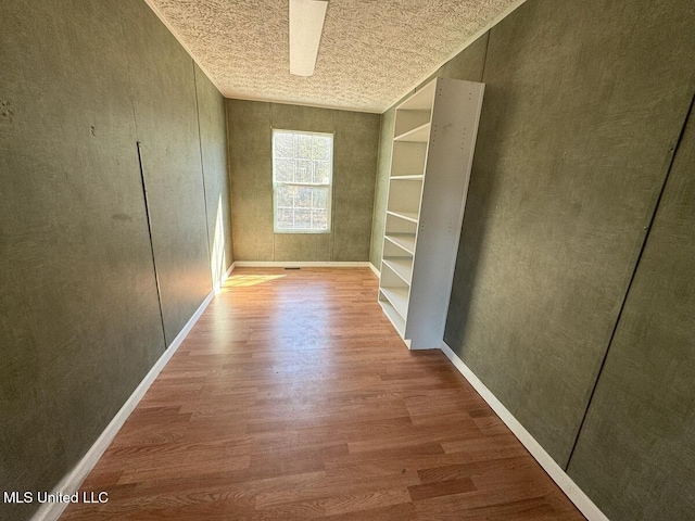 hall featuring wood-type flooring