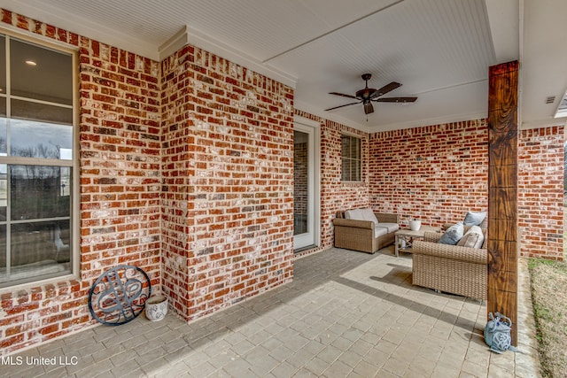 view of patio featuring ceiling fan