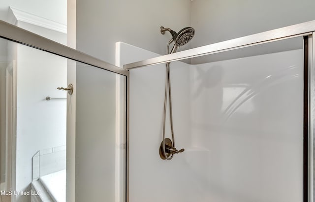 room details featuring a shower with shower door