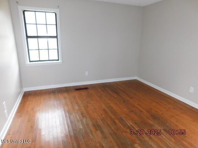 165 Christian College Rd, Senatobia, MS 38668 - spare room featuring wood-type flooring and baseboards