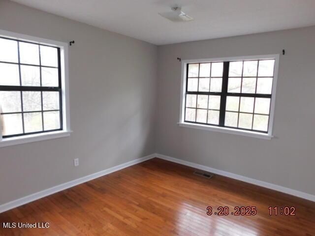 165 Christian College Rd, Senatobia, MS 38668 - empty room with baseboards and wood finished floors