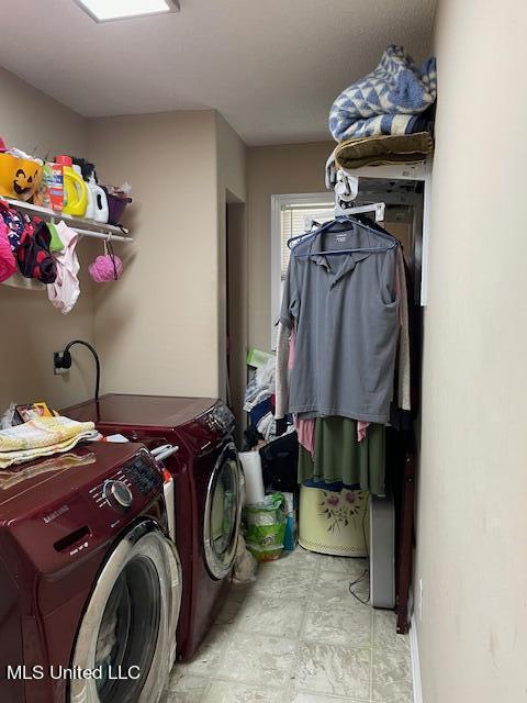 laundry area featuring separate washer and dryer