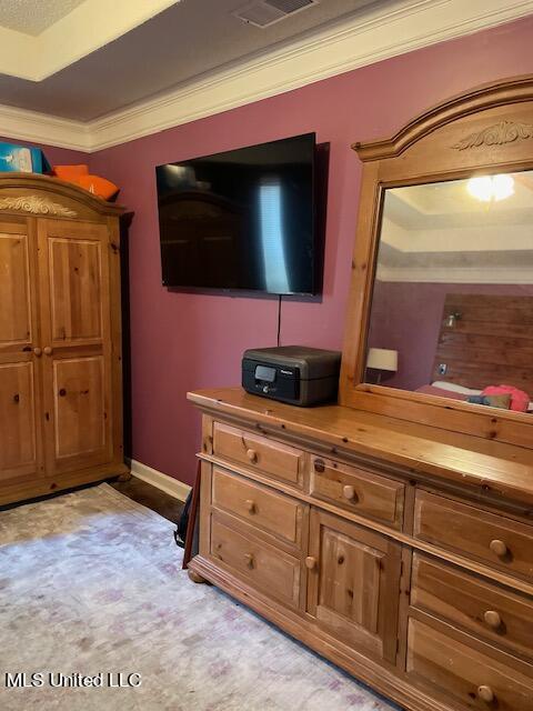 living room with crown molding