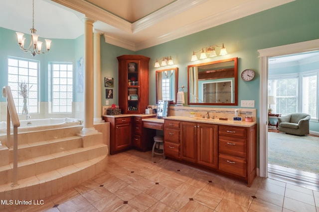 13129 Jordan Bluff Rd, Kiln, MS 39556 - full bath featuring decorative columns, plenty of natural light, crown molding, and a garden tub