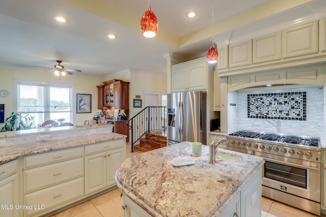13129 Jordan Bluff Rd, Kiln, MS 39556 - kitchen featuring appliances with stainless steel finishes, a ceiling fan, backsplash, crown molding, and light stone counters