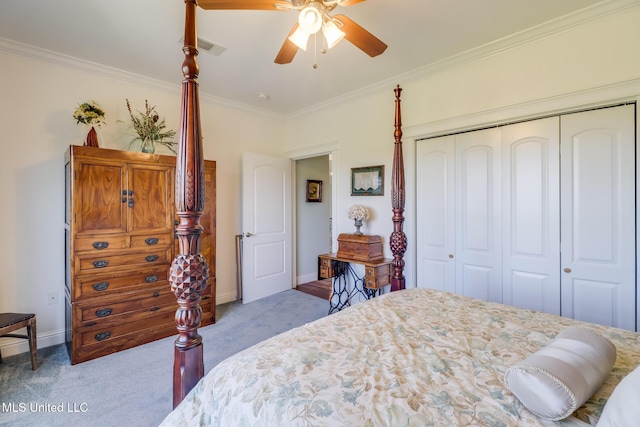13129 Jordan Bluff Rd, Kiln, MS 39556 - carpeted bedroom featuring ornamental molding, a closet, baseboards, and a ceiling fan