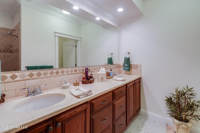 13129 Jordan Bluff Rd, Kiln, MS 39556 - bathroom with ornamental molding, decorative backsplash, double vanity, baseboards, and recessed lighting