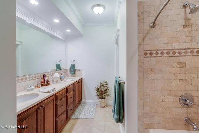 13129 Jordan Bluff Rd, Kiln, MS 39556 - full bathroom featuring crown molding, double vanity, tile patterned floors, washtub / shower combination, and tasteful backsplash