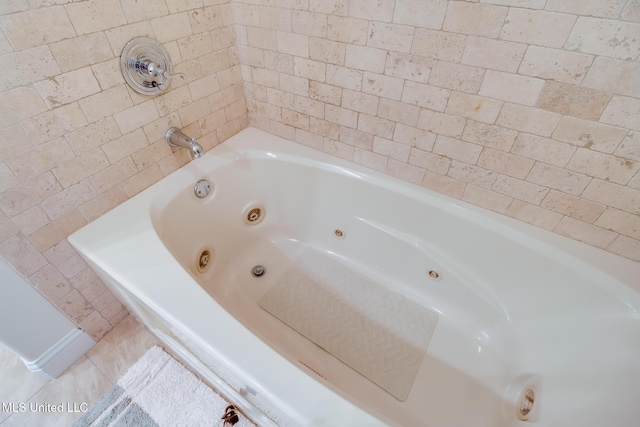 13129 Jordan Bluff Rd, Kiln, MS 39556 - full bath with a whirlpool tub and tile patterned floors