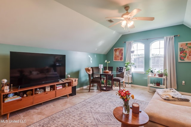 13129 Jordan Bluff Rd, Kiln, MS 39556 - living area with lofted ceiling, a ceiling fan, and baseboards