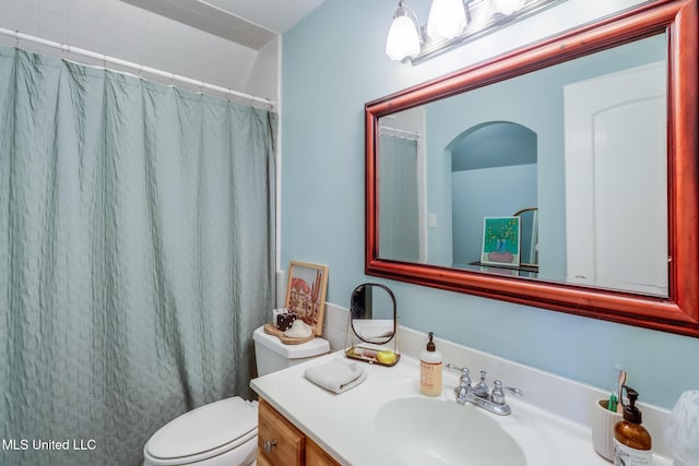 13129 Jordan Bluff Rd, Kiln, MS 39556 - full bathroom featuring vanity, toilet, and a shower with curtain