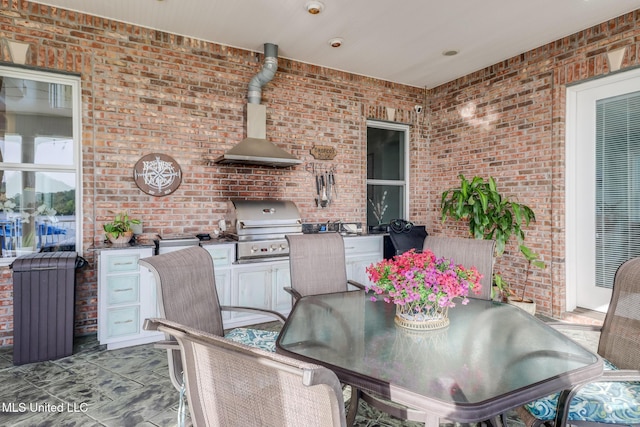 13129 Jordan Bluff Rd, Kiln, MS 39556 - view of patio featuring an outdoor kitchen, a grill, and outdoor dining area