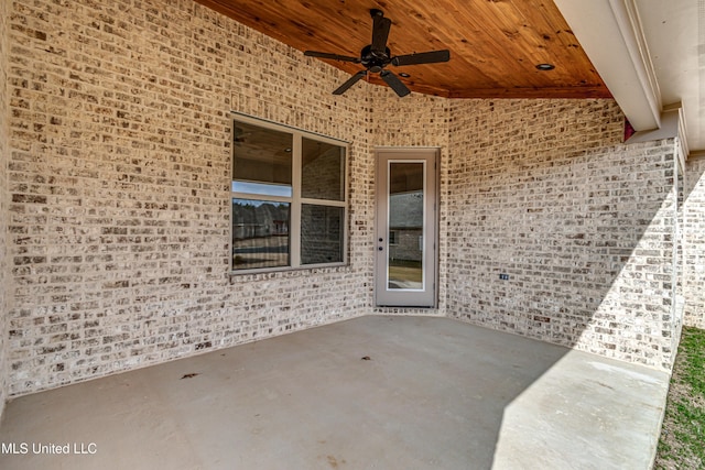 view of patio featuring ceiling fan