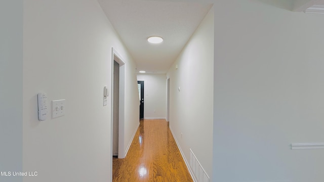 2595 Hunters Pointe Dr, Southaven, MS 38672 - hallway with light wood finished floors and baseboards
