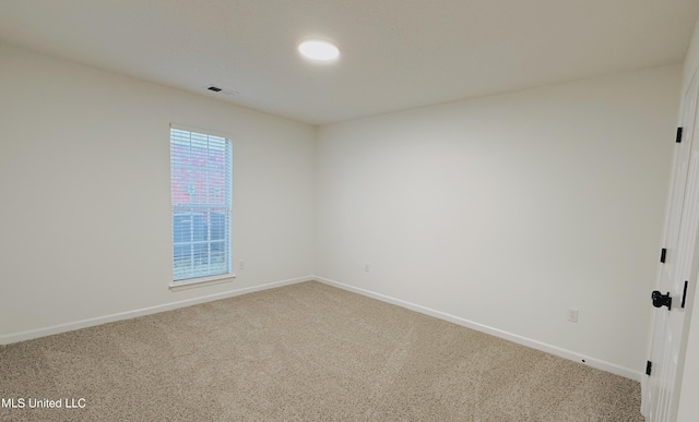 2595 Hunters Pointe Dr, Southaven, MS 38672 - carpeted empty room featuring baseboards