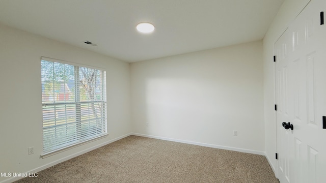 2595 Hunters Pointe Dr, Southaven, MS 38672 - carpeted spare room featuring baseboards