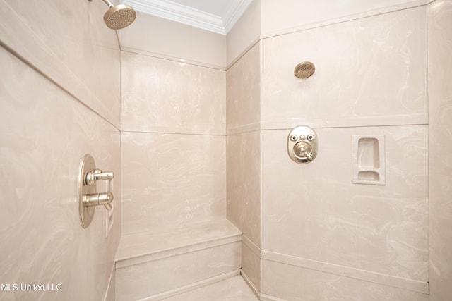 bathroom featuring crown molding and a shower
