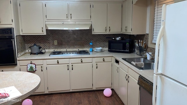 kitchen with backsplash, white cabinets, dark hardwood / wood-style floors, and black appliances