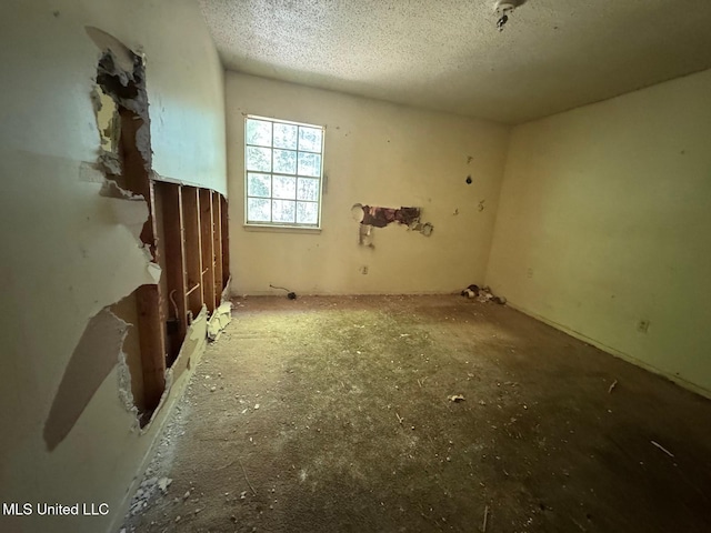 908 Wabash Ave, Vicksburg, MS 39183 - spare room with a textured ceiling