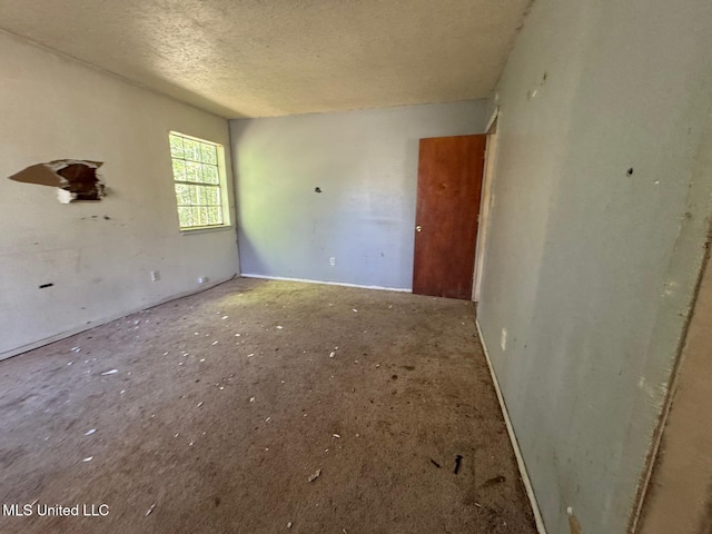 908 Wabash Ave, Vicksburg, MS 39183 - unfurnished room with a textured ceiling