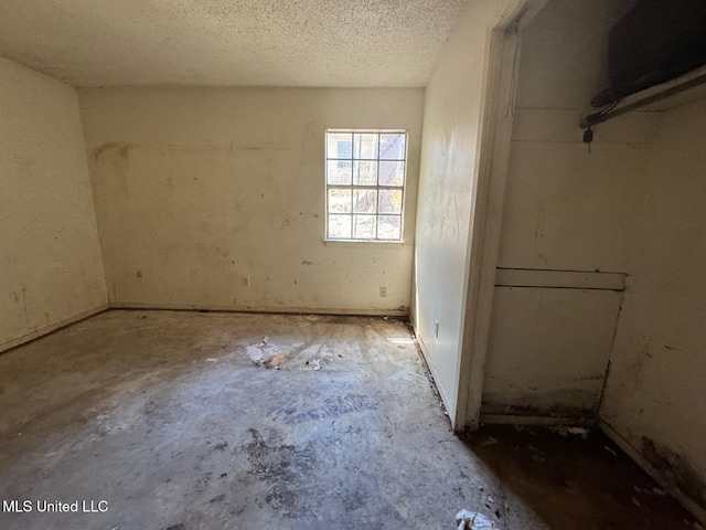 908 Wabash Ave, Vicksburg, MS 39183 - unfurnished bedroom with a textured ceiling
