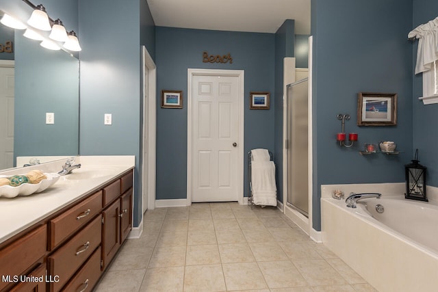 bathroom with vanity, plus walk in shower, and tile patterned floors