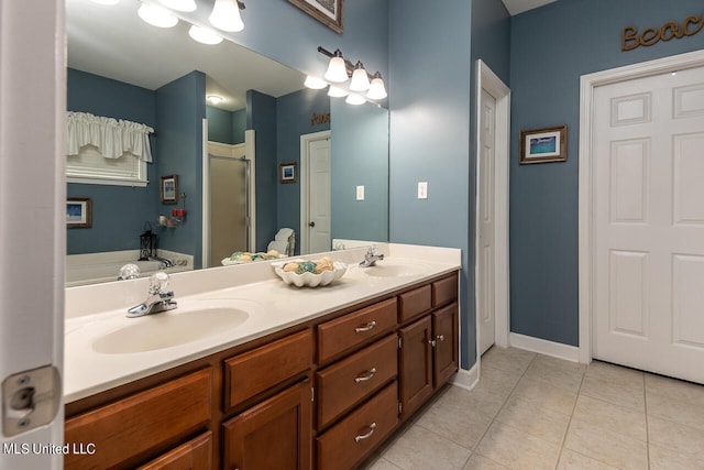 bathroom with vanity, separate shower and tub, and tile patterned flooring