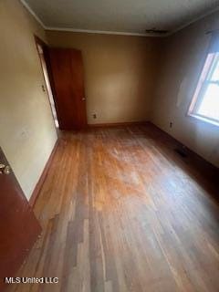 5685 Carrollton Rd, Grenada, MS 38901 - unfurnished room featuring ornamental molding and light hardwood / wood-style flooring