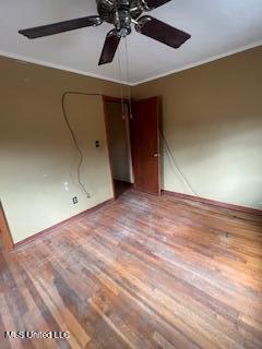 5685 Carrollton Rd, Grenada, MS 38901 - spare room featuring crown molding, hardwood / wood-style floors, and ceiling fan