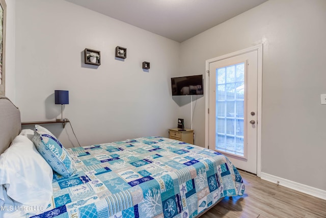 bedroom with light wood-type flooring