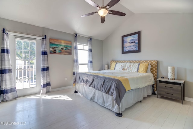 bedroom with light hardwood / wood-style flooring, ceiling fan, access to outside, and lofted ceiling