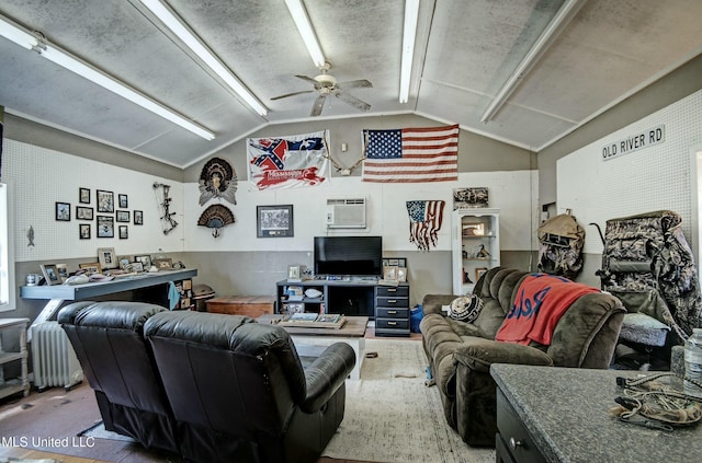 living room with ceiling fan, lofted ceiling, radiator, and a wall mounted AC