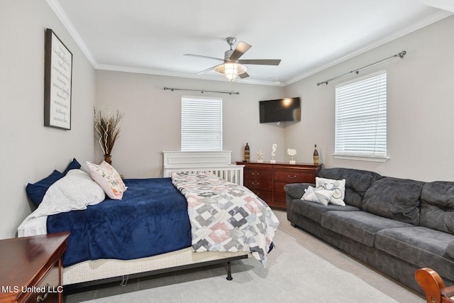 bedroom with multiple windows, ceiling fan, and crown molding