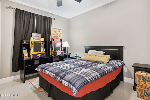 bedroom with ceiling fan, crown molding, and light tile patterned floors