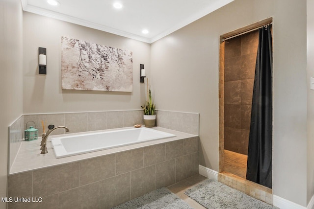 bathroom with tile patterned floors, plus walk in shower, and ornamental molding