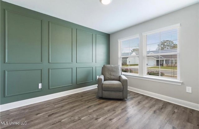 14451 Quail Ridge Dr, Gulfport, MS 39503 - living area with dark wood-style flooring and baseboards