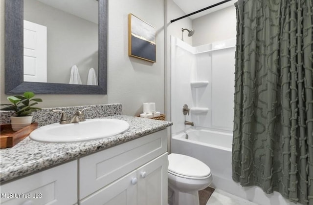 14451 Quail Ridge Dr, Gulfport, MS 39503 - full bathroom featuring shower / bath combo, vanity, and toilet
