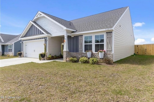 14451 Quail Ridge Dr, Gulfport, MS 39503 - craftsman-style house with board and batten siding, driveway, an attached garage, and roof with shingles