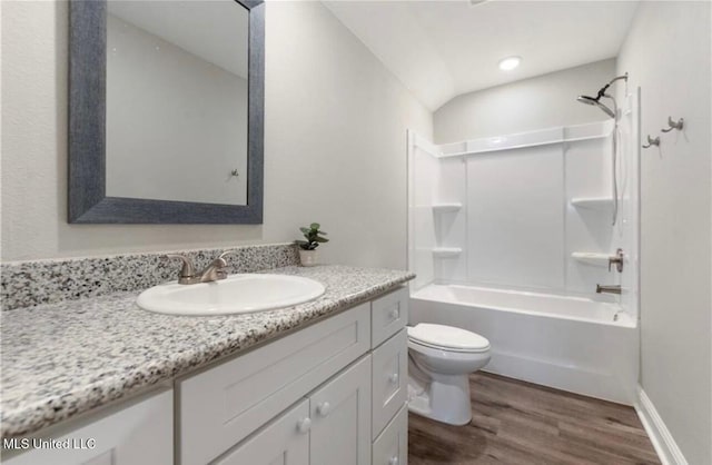 14451 Quail Ridge Dr, Gulfport, MS 39503 - bathroom featuring wood finished floors, toilet, vanity, shower / tub combination, and recessed lighting