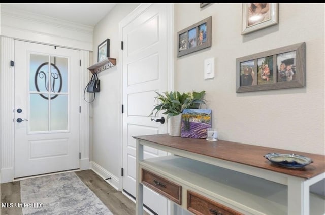 14451 Quail Ridge Dr, Gulfport, MS 39503 - mudroom featuring wood finished floors, baseboards, and ornamental molding
