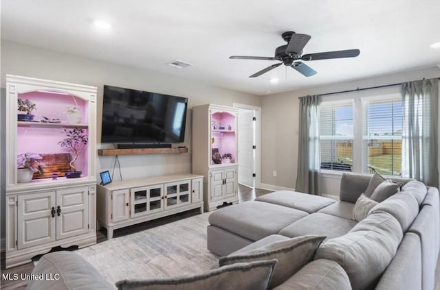 14451 Quail Ridge Dr, Gulfport, MS 39503 - living room featuring a ceiling fan, baseboards, recessed lighting, and wood finished floors