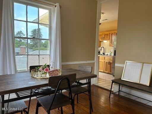 1116 Main St, Natchez, MS 39120 - dining space with wood finished floors