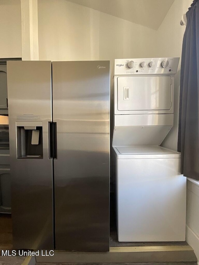 1116 Main St, Natchez, MS 39120 - laundry room featuring stacked washer and dryer and laundry area